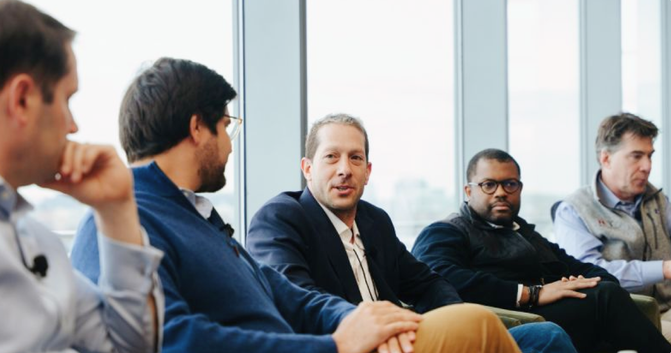 People seated in a business discussion